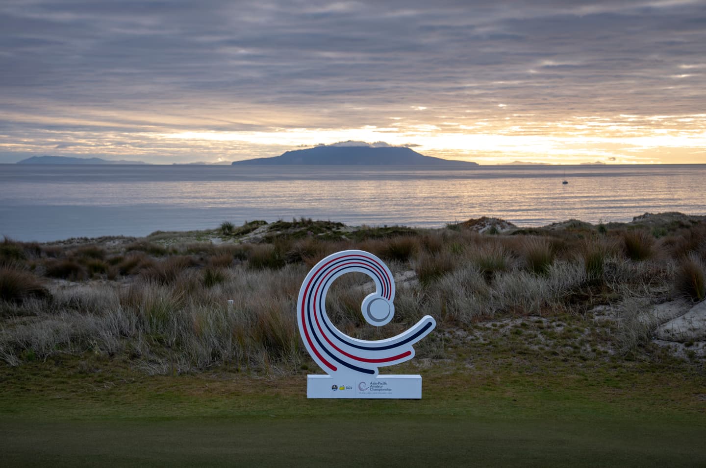 The AAC Logo is seen on No. 9 hole at Te Arai Links
